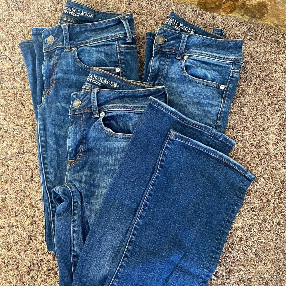 2 pair American Eagle super stretch kick boot jeans womens